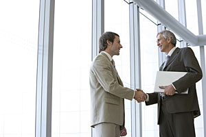 Image: Business men shaking hands Image: Business men shaking hands