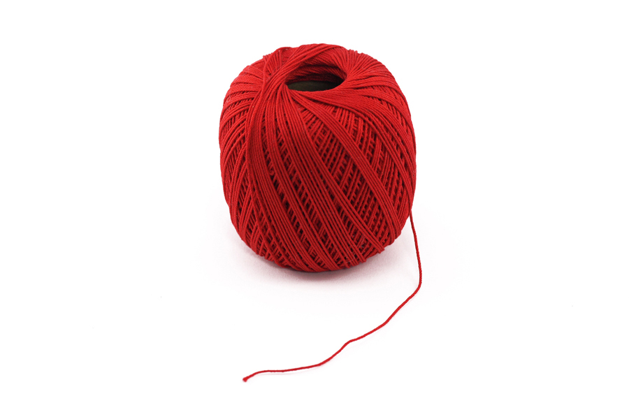 Image: Ball of red wool with one lose end to follow Image: Ball of red wool with one lose end to follow