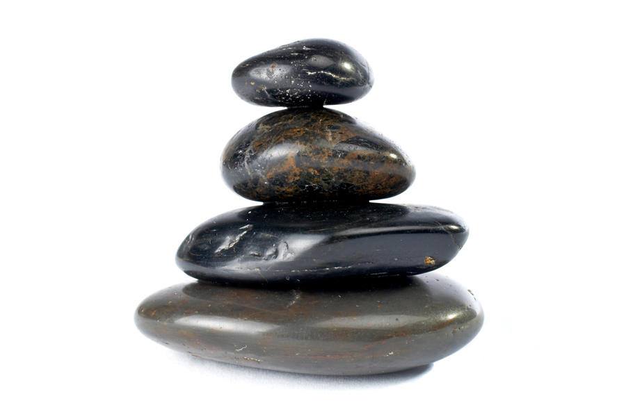 Image: Four stones piled on top of each other Image: Four stones piled on top of each other