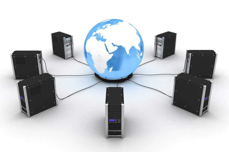 Image: Computers connected by wires to a globe at the center Image: Computers connected by wires to a globe at the center