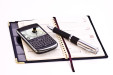 Bild: Terminkalender mit Bild und Mobiltelefon