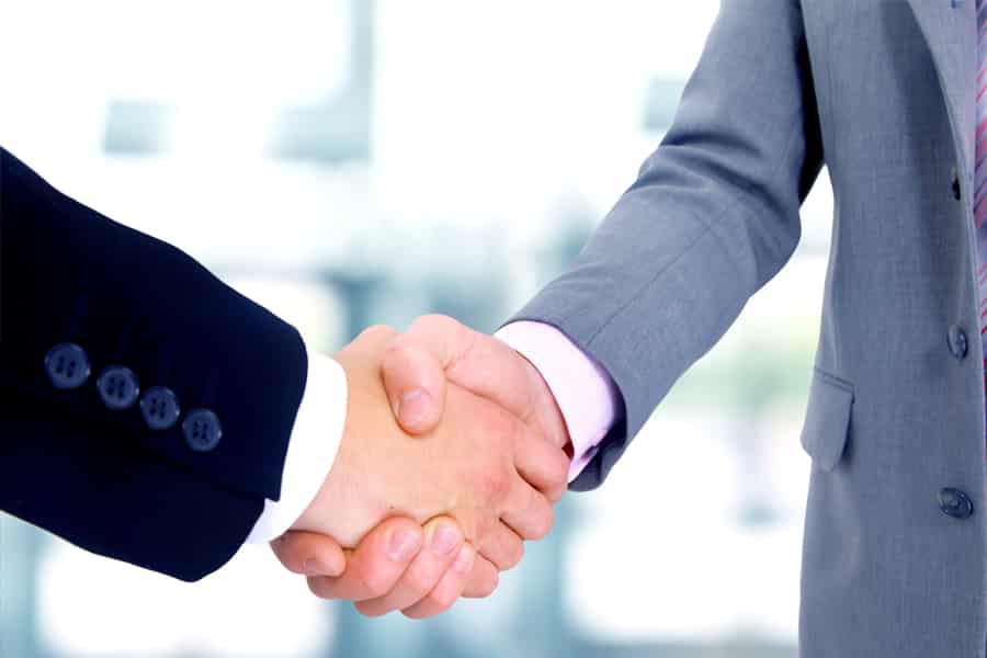 Bild: CONET, Handschlag, Buisness